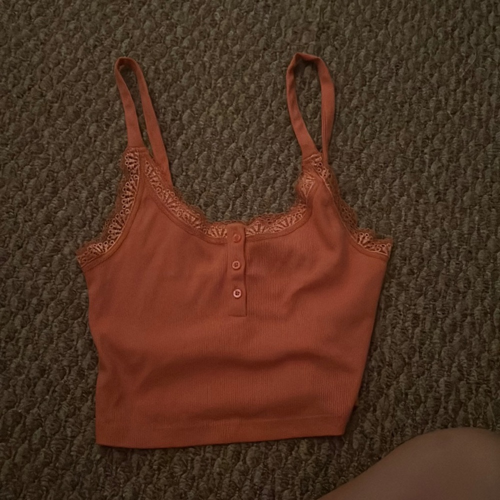 orange coral top, size small, never worn